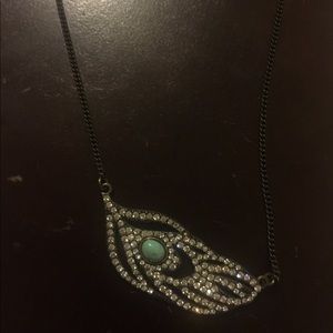 Necklace with turquoise in the middle